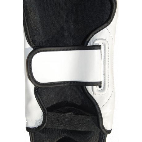 ESPINILLERAS CON EMPEINE PROFESIONAL SPARRING